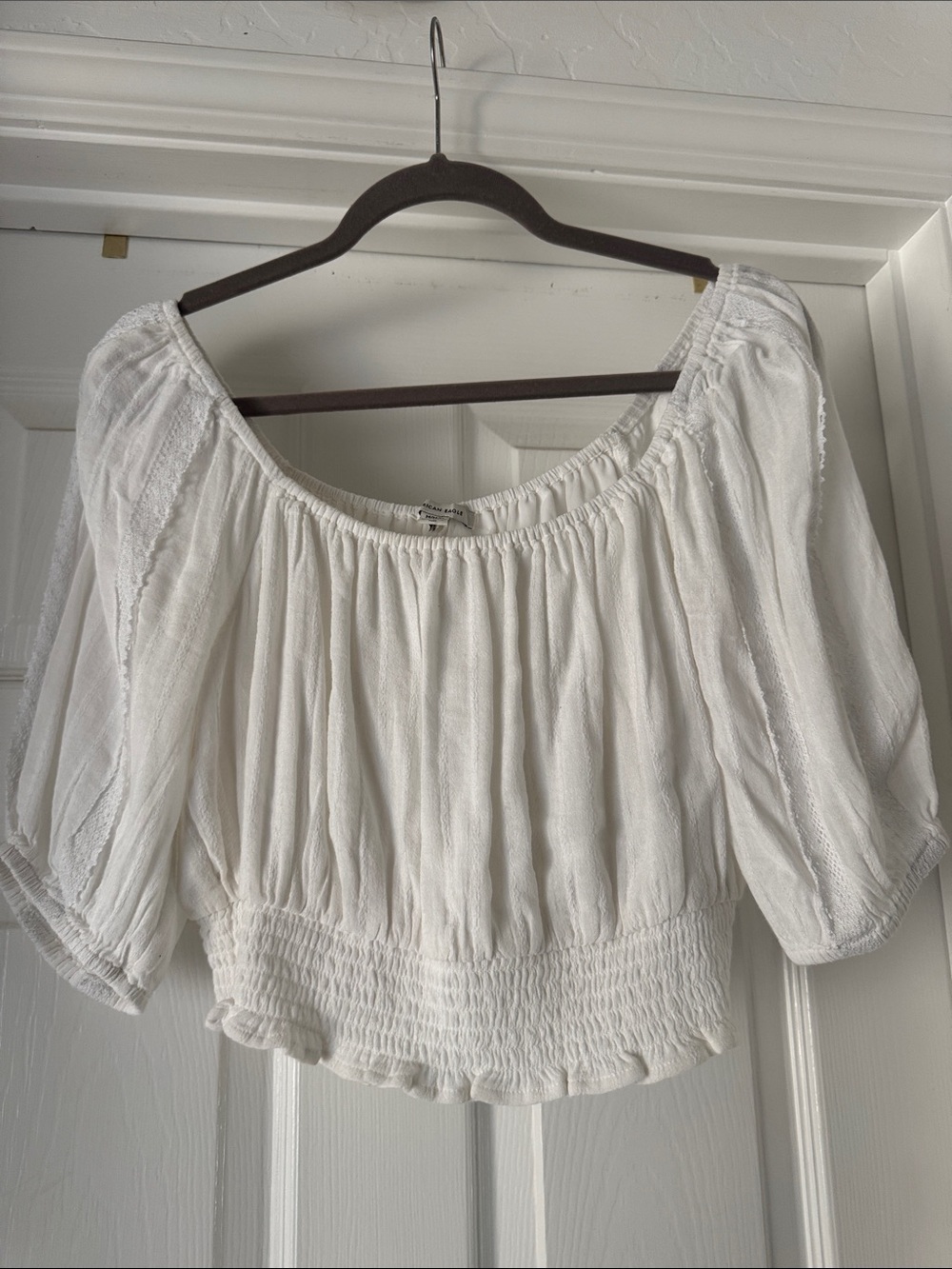 American Eagle Outfitters White Off-Shoulder Smocked Crop Top